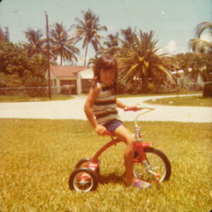 Cheri on tricycle